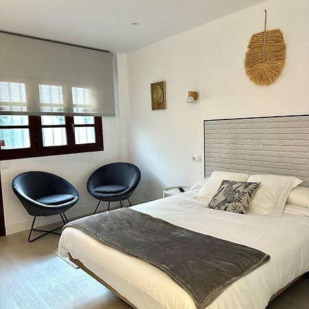 Apartamentos Val De Comillas Bagian luar foto
